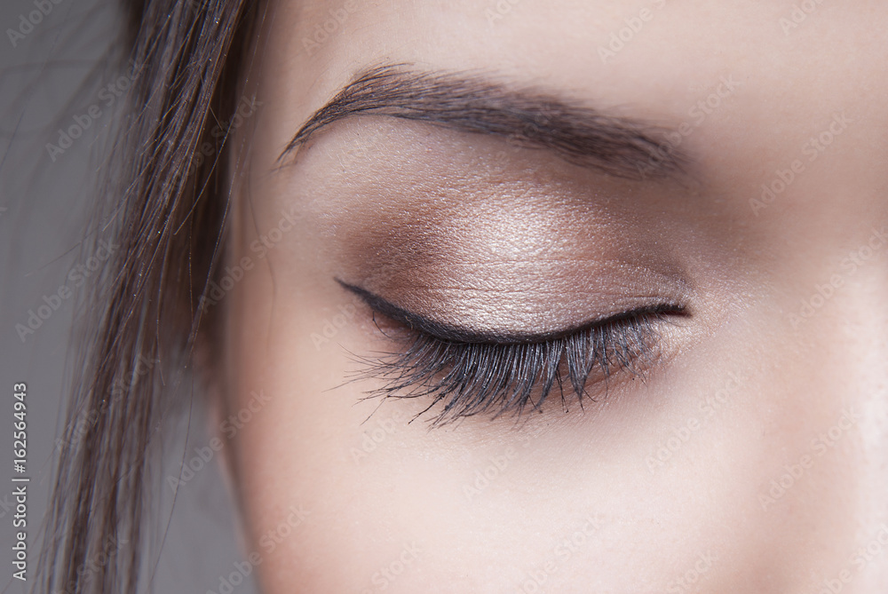 Naklejka premium day makeup on one eye macro
