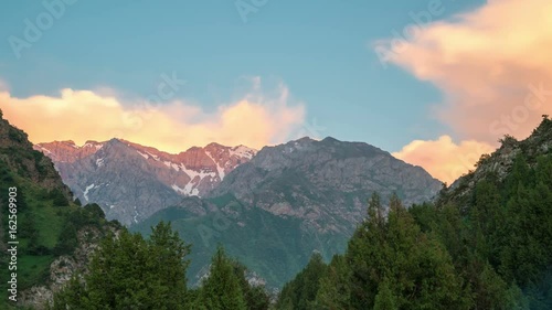 Timelapse of Most clouded sky high above the mountains in Sairamsu, Kazakhstan photo