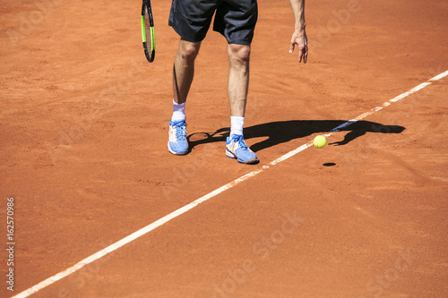 Tennis player ready to serve © photostocklight