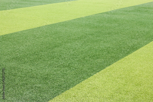 Photo of a green synthetic grass sports field