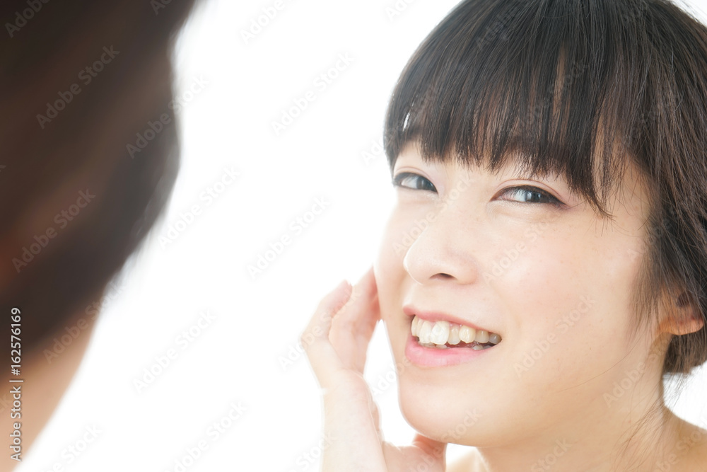 Young woman doing skin care Young woman doing skin care