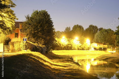 Venice, Italy, June, 9, 2017: night landscape with the image of channel in Rovigo, Italy photo
