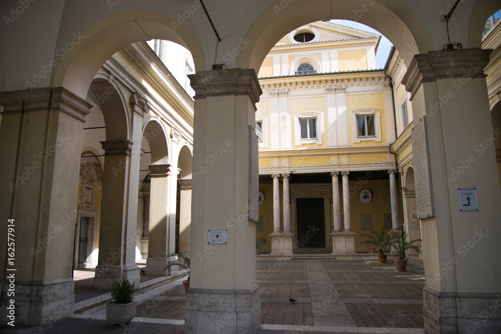 General view of  the central courtyard with columns in the church di San Gregorio al Celio in Rome, capital of Italy