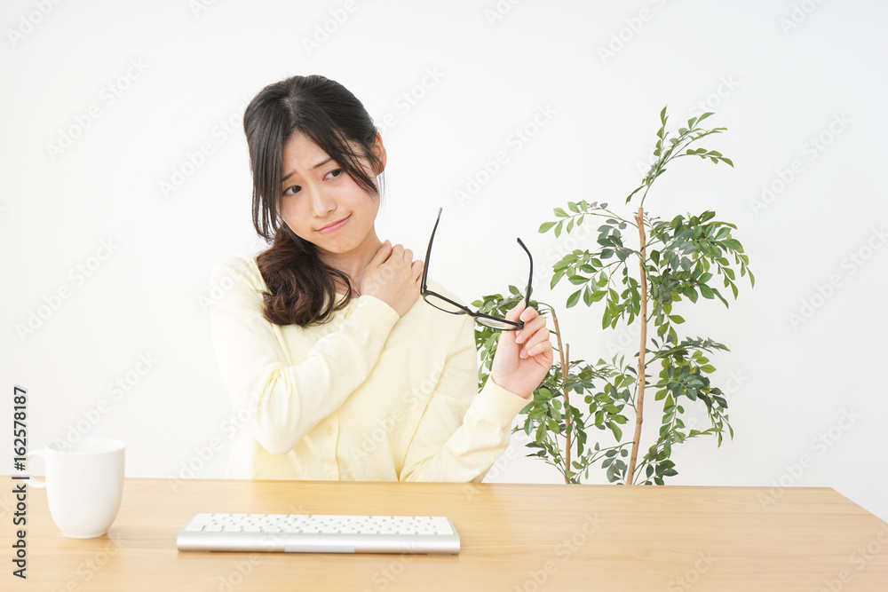 Young woman being be fatigued with office work Young woman being be fatigued with office work