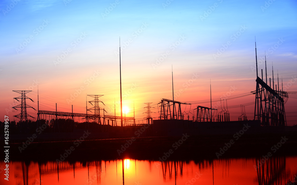 High voltage substation in the setting sun
