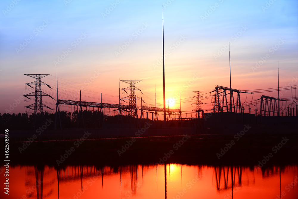 High voltage substation in the setting sun