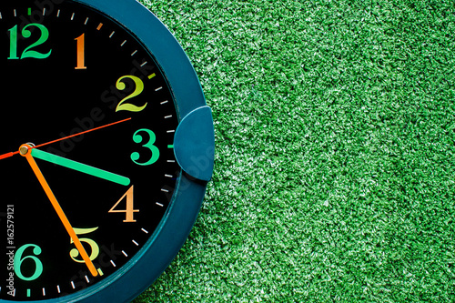 Clock on the plastic artifi...