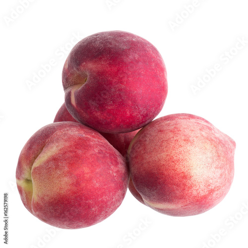 Ripe fresh peaches isolated on white background