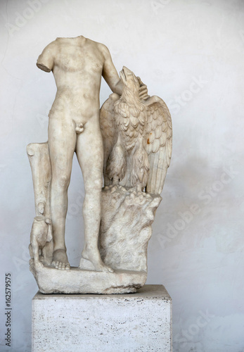 Ancient sculpture of the man with an eagle in the baths of Diocletian (Thermae Diocletiani) in Rome. Italy