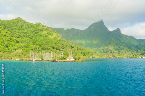 The Beautiful sea and sailing boats park in Moorae Island at Tahiti PAPEETE, FRENCH POLYNESIA.