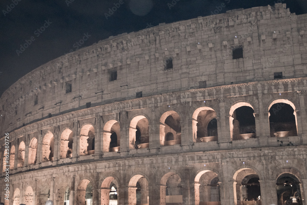 Naklejka premium Night view of Colosseum in Rome, Italy