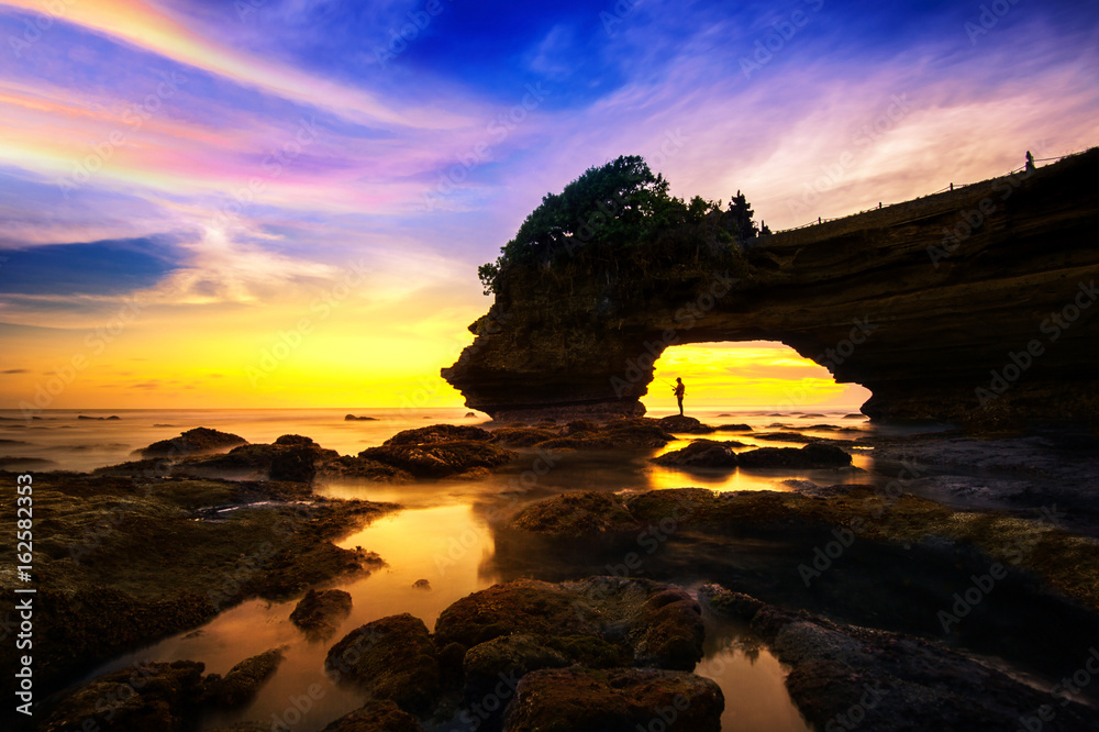 Seascape at Tanah Lot Temple and sunset in Bali, Indonesia.(Dark) Seascape at Tanah Lot Temple and sunset in Bali, Indonesia.(Dark)