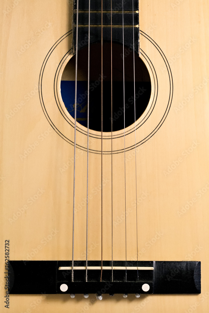 Obraz premium Horizontal detail of the fret board of a guitar