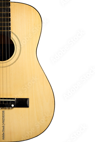 Close up of a traditional guitar on a white background photo