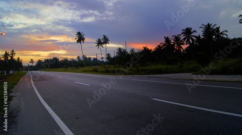 Leading line road. Sunrise scenery view © umarazak
