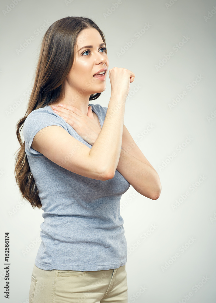 Coughing woman with long hair casual dressed.