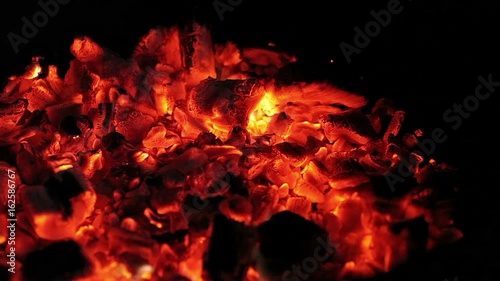 Burning coals in the evening darkness on the island of Mallorca.