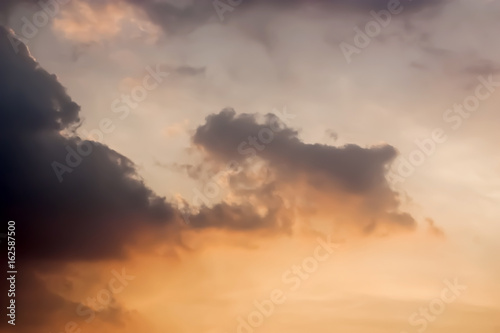Dramatic Atmosphere of sunset sky and clouds at the evening golden time.