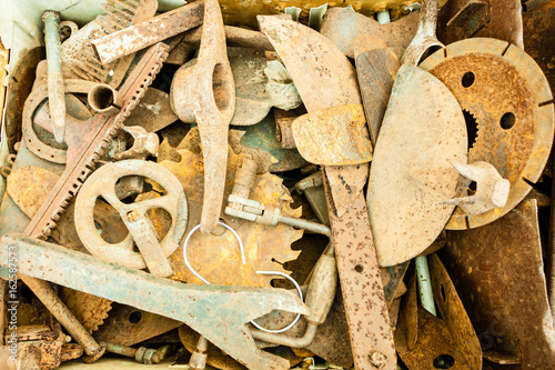 pile of rusted metal on a junkyard