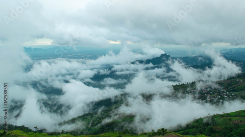 mountains under mist in the morning in thailand