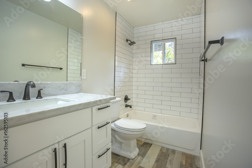 Model homes always show off beautiful bathrooms with clever design