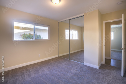 Empty bedroom in a model home in southern California