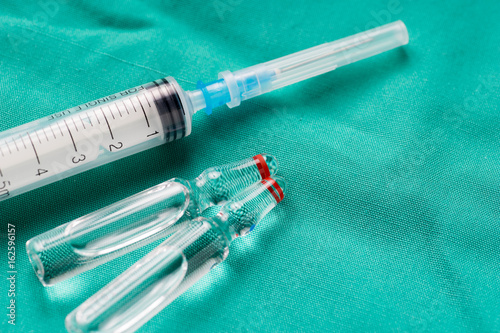 Medical syringe and vials