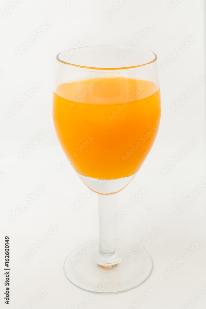 Glass of fresh orange juice on white background Glass of fresh orange juice on white background