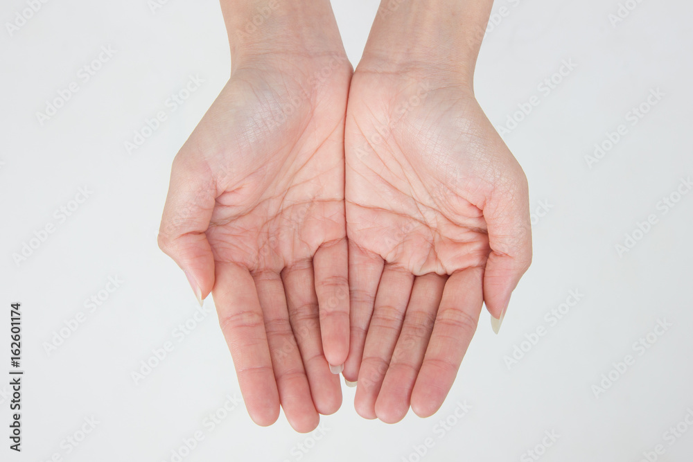 Fototapeta premium two empty female teen hands pleading, isolated on white