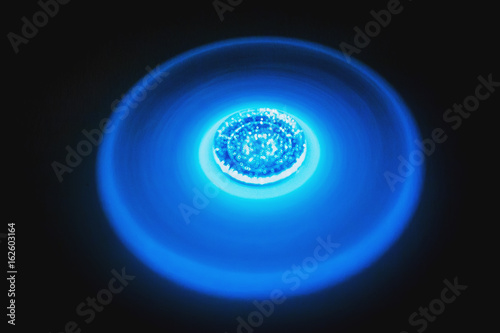 Fidget Spinner glows and spins in the dark  selective focus