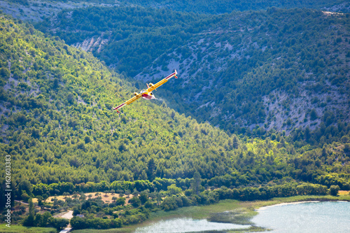 Firefighting plane in the air photo