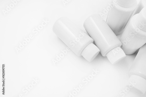 White bottles on a white background