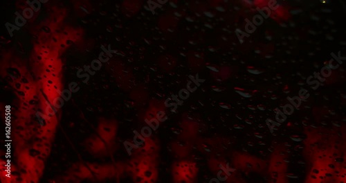 Wallpaper Mural Defocused colorful hearts flashing in rain at night. Torontodigital.ca