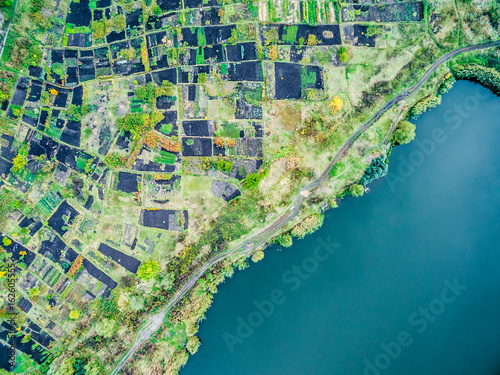 Aerial view - lake shore with pied gardens