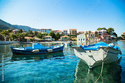 Boat in the bay in Assos village, Kefalonia island, Greece. © nadianb