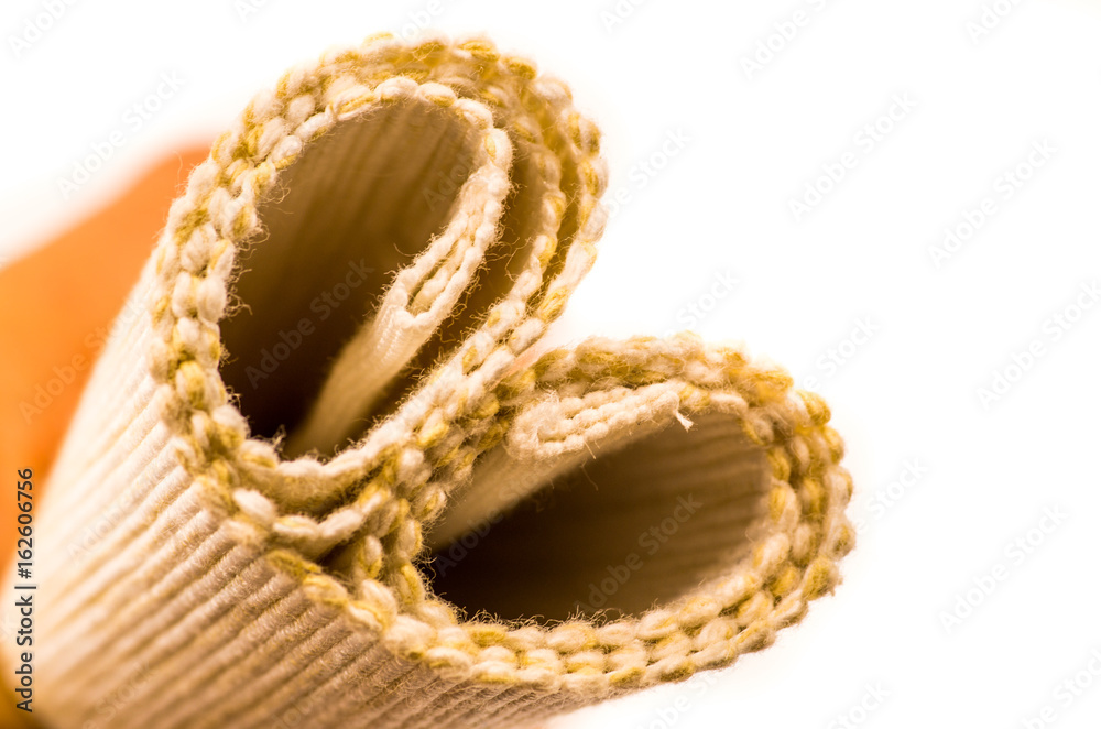 linen texture roll in a hand linen texture roll in a hand