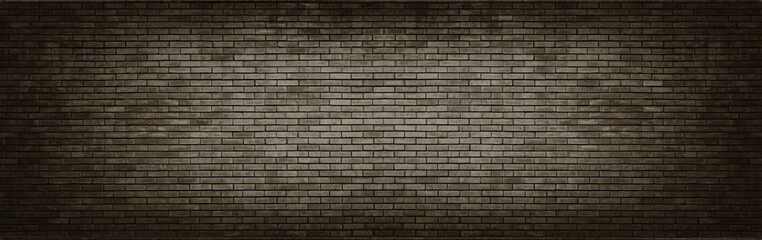 Black brick wall panoramic background.