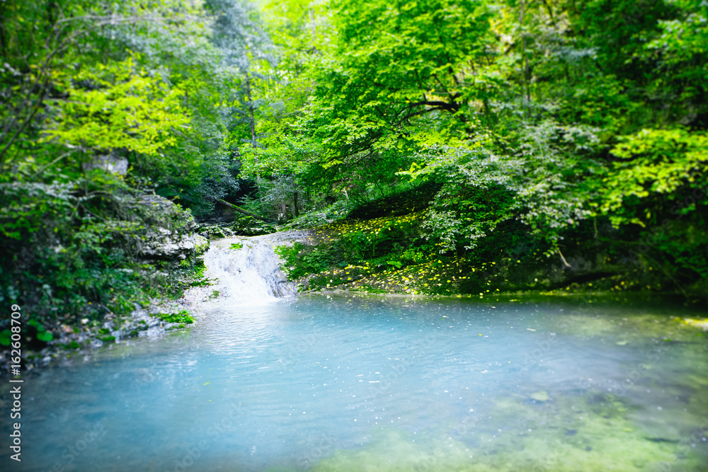Fototapeta premium Beautiful waterfall in Adygea mountains