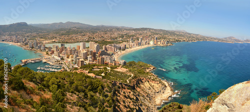 Fotografija Costa Blanca Panorama
Panoramic view of Calpe from famous rock - Penon de Ifach,  overlooking the coast, the harbor, lake and the city