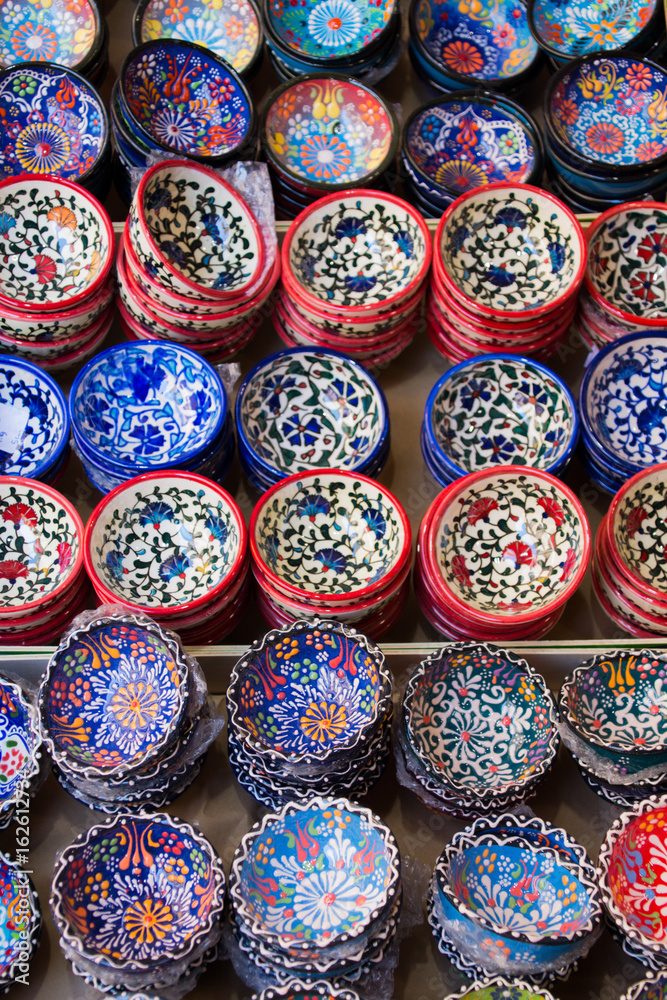 Traditional Cretan painted ceramic dishes for sale at a city centre shop Crete, Greece, Europe.