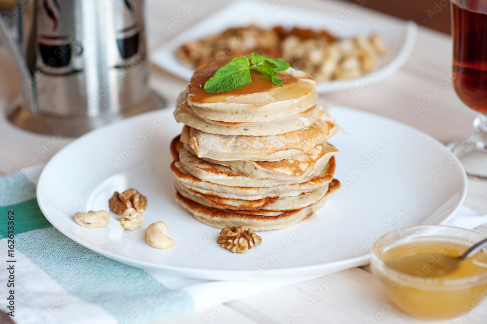 Pancake with honey or maple syrup