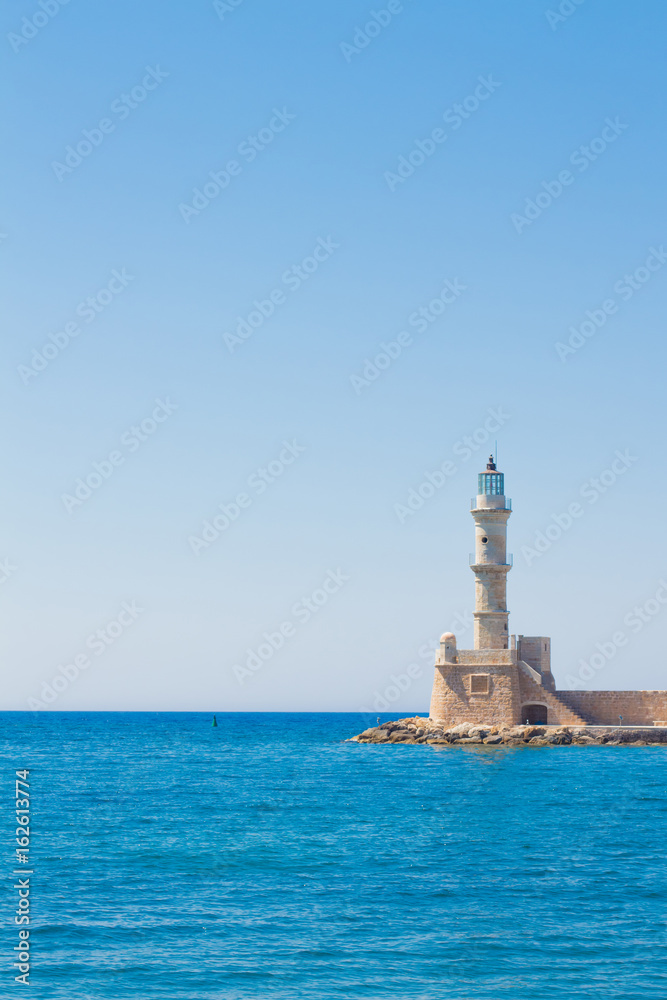 Venetian lighthouse at the harbour entrance, Chania, Crete, Greece, Europe.