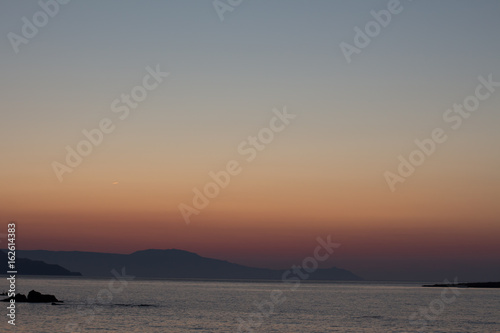 amazing golden sunset at the city of Chania in Crete  Greece. Aegean Sea