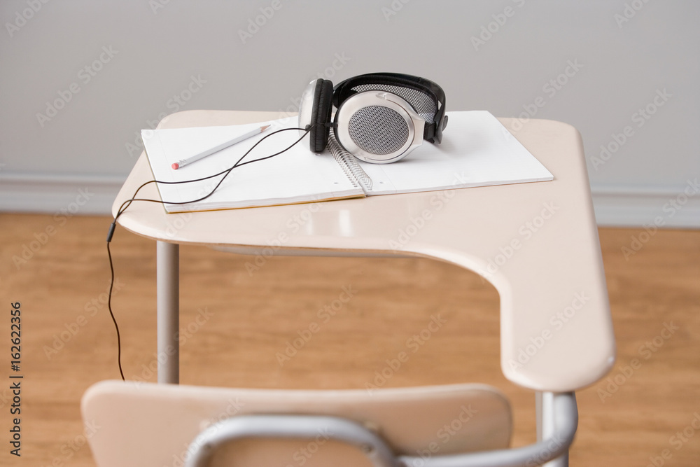 Fotografie Headphones on a desk