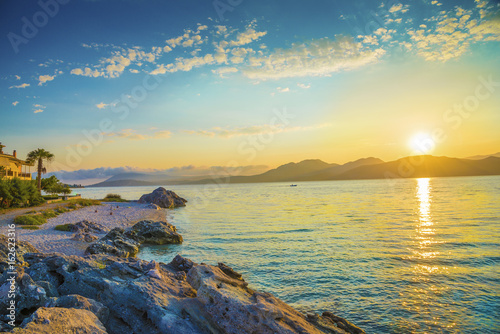 Fototapeta Naklejka Na Ścianę i Meble -  Beautiful sunrise over the Ionian sea in Lefkada island beach in Greece