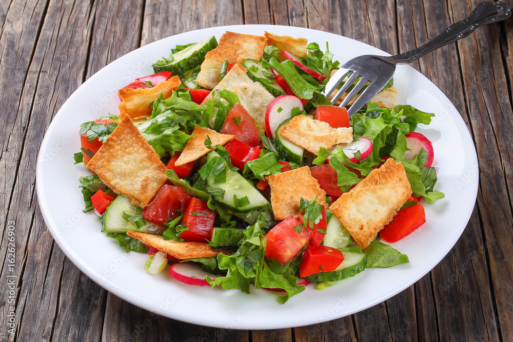 Fattoush or bread salad on plate