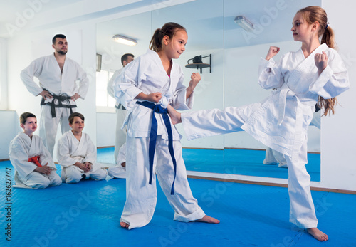Young females are trying in sparring to use new moves