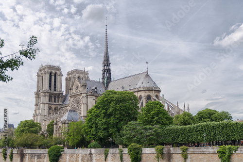  Paris, Notre-Dame cathedral in the ile de la Cite, cloudy sky 