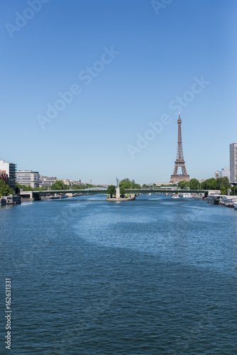 Paris, Eiffel tower, pont de Grenelle with Liberty statue on the Seine 
