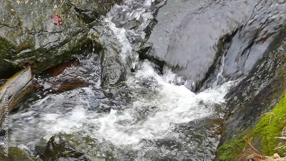 Waterfall of the mountain river Waterfall of the mountain river